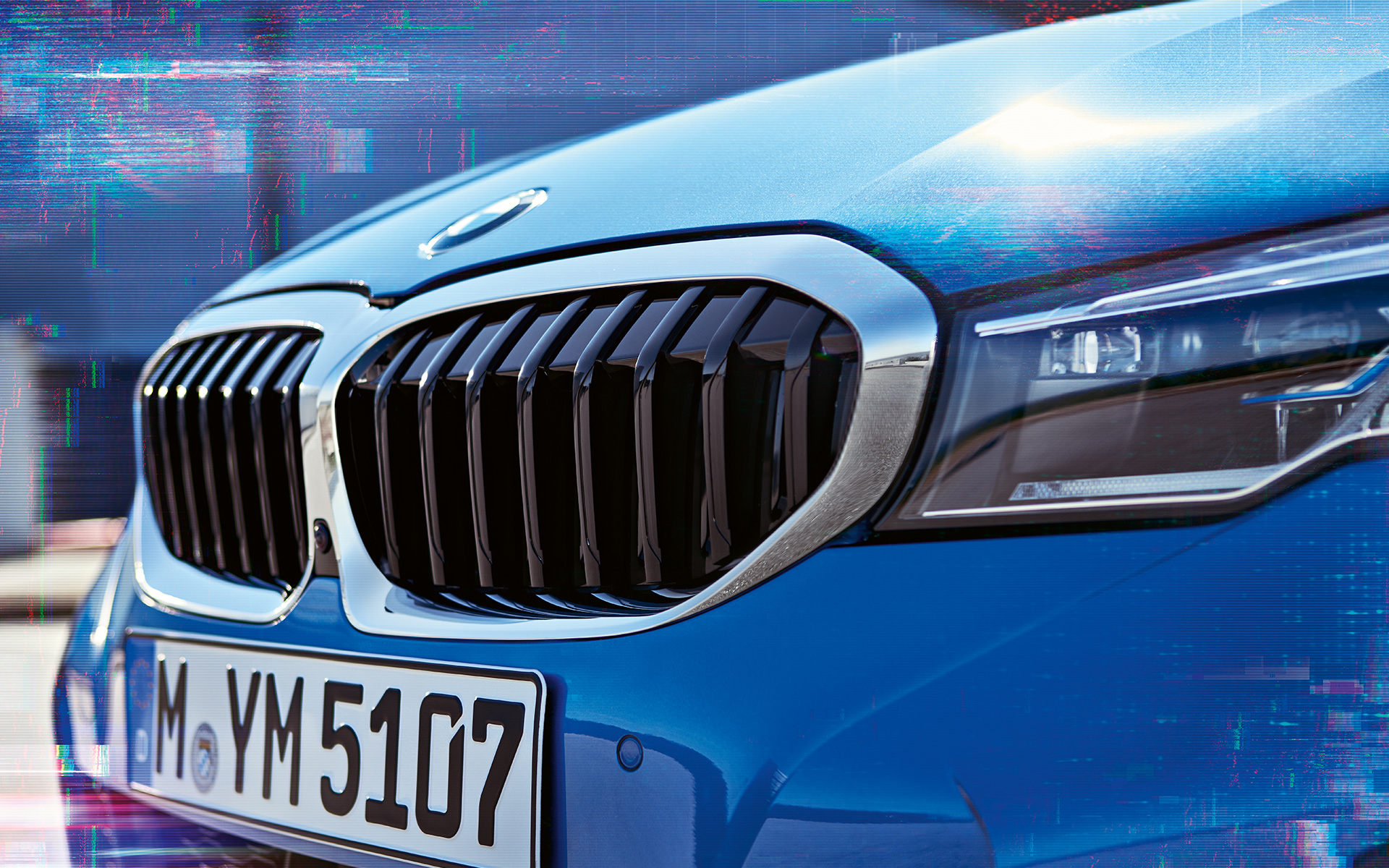 Close-up side view of the BMW 3 Series Sedan (G20) double kidney grille.