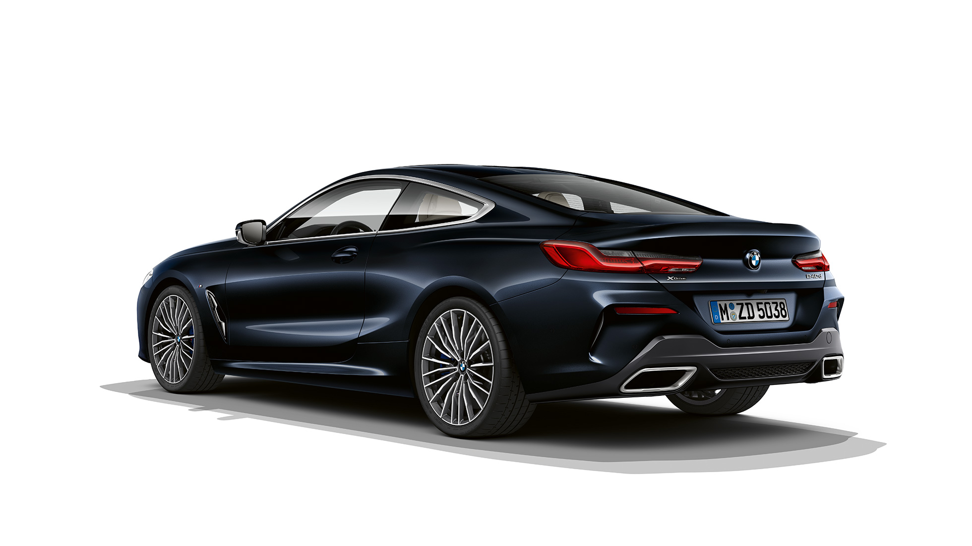 BMW 8 Series Coupé, Carbon Black metallic, three-quarter back view.